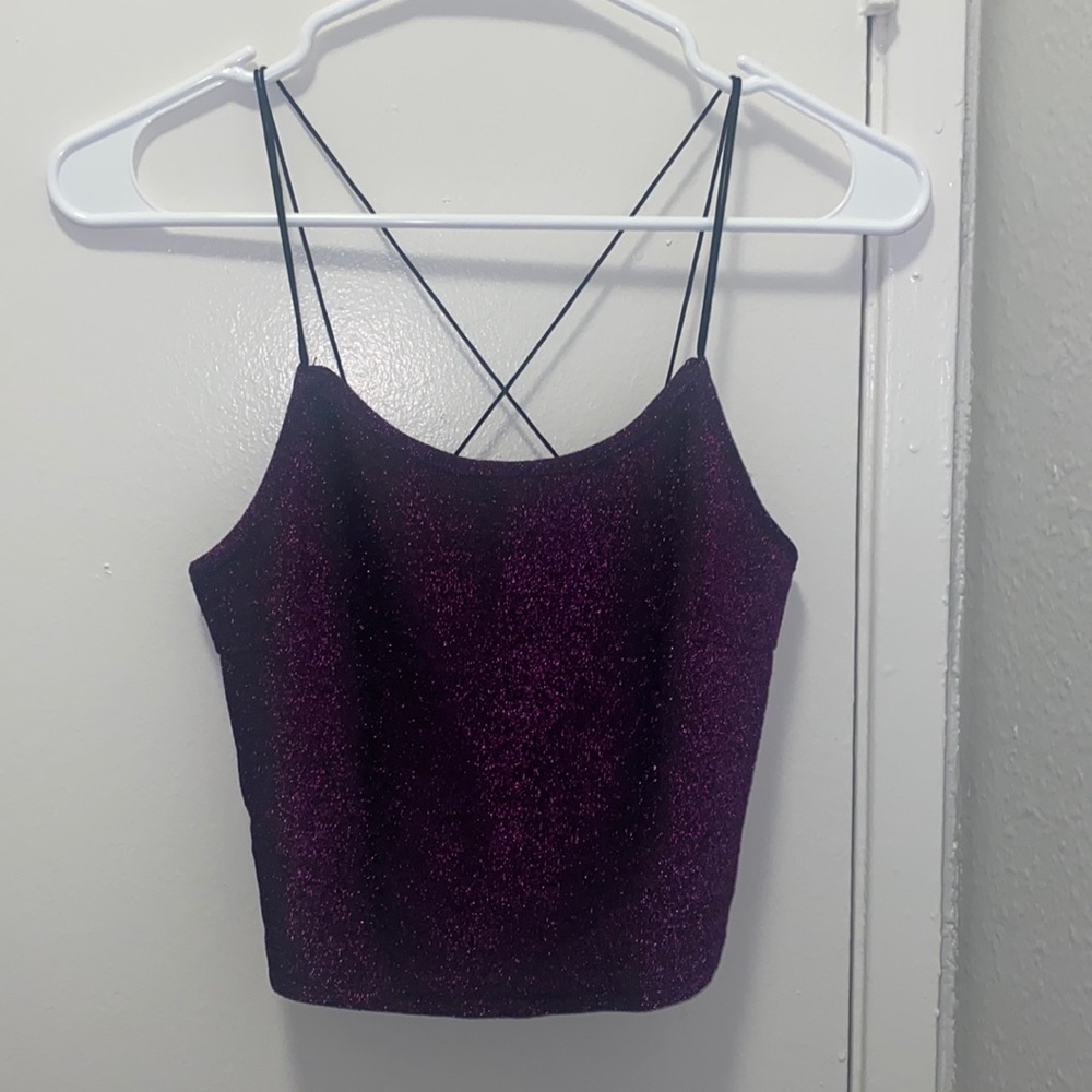 Cute tank top, perfect for going out. Cross back.